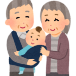 孫を抱く年配者　
