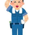 汗を拭う整備士