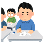 真面目に試験を受けている男の子